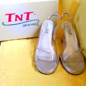 Clear/silver TNT original women's shoes size 7